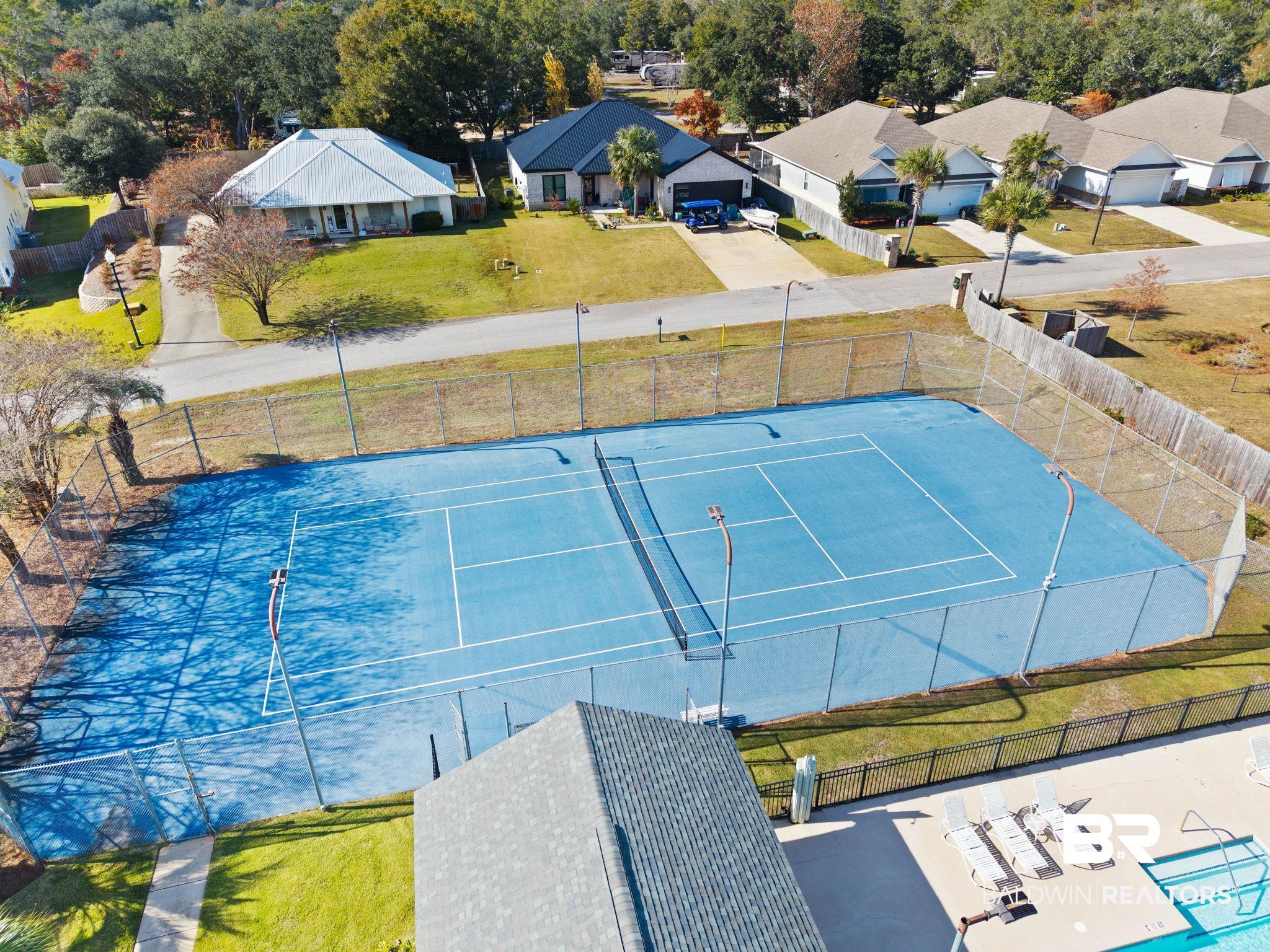 4143 Harbor Road Orange Beach, AL 36561 - Photo 32 of 33 View of tennis court with a residential view, community basketball court, and a patio