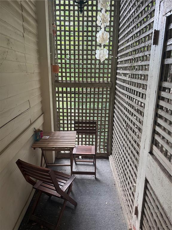 846 Briarcliff Road Northeast Atlanta, GA 30306 - Photo 15 of 22 a view of a wooden bench sitting in front of building