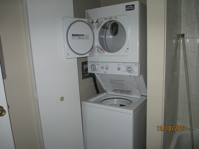1901 North Hicks Road, Unit 103 Palatine, IL 60074 - Photo 7 of 7 a utility room with dryer and washer