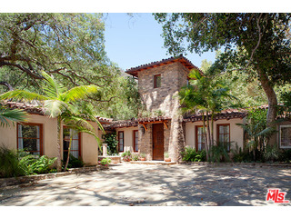 2000 Old Ranch Road Los Angeles, CA 90049 - Photo 1 of 30 a view of a house with a tree and plants