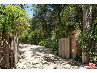 2000 Old Ranch Road Los Angeles, CA 90049 - Photo 2 of 30 a view of a backyard of the house