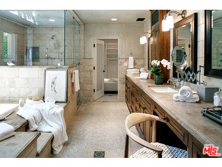 2000 Old Ranch Road Los Angeles, CA 90049 - Photo 12 of 30 a bathroom with double vanity and a bathtub