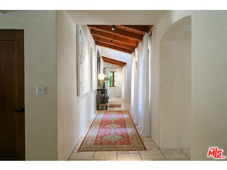 2000 Old Ranch Road Los Angeles, CA 90049 - Photo 15 of 30 a view of a bedroom from a hallway