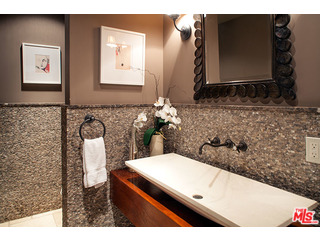 2000 Old Ranch Road Los Angeles, CA 90049 - Photo 18 of 30 a bathroom with a sink and a mirror