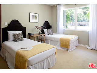 2000 Old Ranch Road Los Angeles, CA 90049 - Photo 19 of 30 a bedroom with two beds and a large window