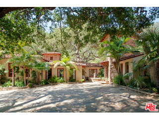 2000 Old Ranch Road Los Angeles, CA 90049 - Photo 3 of 30 a front view of a house with a yard