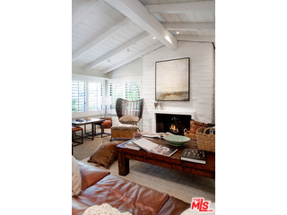 2000 Old Ranch Road Los Angeles, CA 90049 - Photo 24 of 30 a living room with furniture and a fireplace