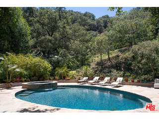 2000 Old Ranch Road Los Angeles, CA 90049 - Photo 26 of 30 a view of swimming pool with a yard