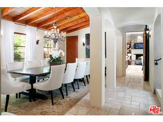 2000 Old Ranch Road Los Angeles, CA 90049 - Photo 7 of 30 a view of a dining room with furniture and a chandelier