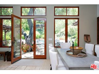 2000 Old Ranch Road Los Angeles, CA 90049 - Photo 9 of 30 a living room with furniture and large windows