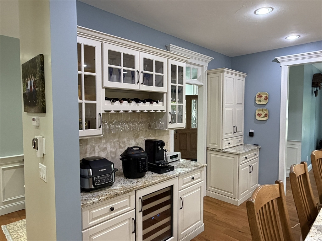4 Tamarack Lane Sandwich, MA 02563 - Photo 7 of 42 a kitchen with stainless steel appliances granite countertop a stove and a sink