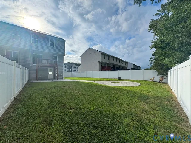a house view with a garden space