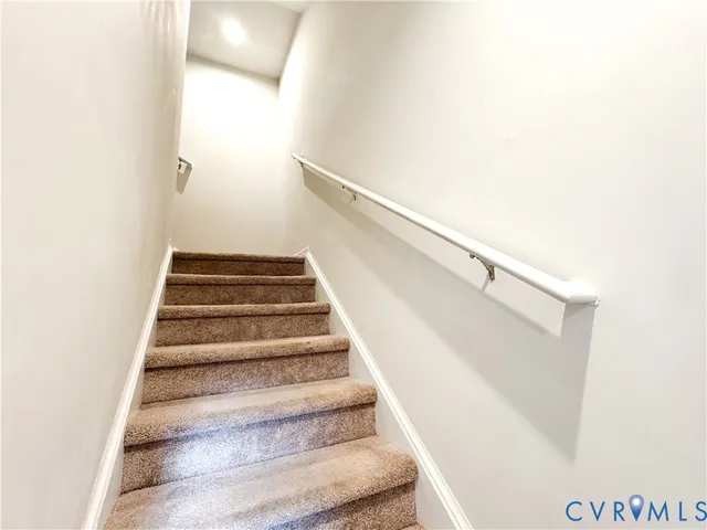 a bathroom with a sink a mirror and vanity
