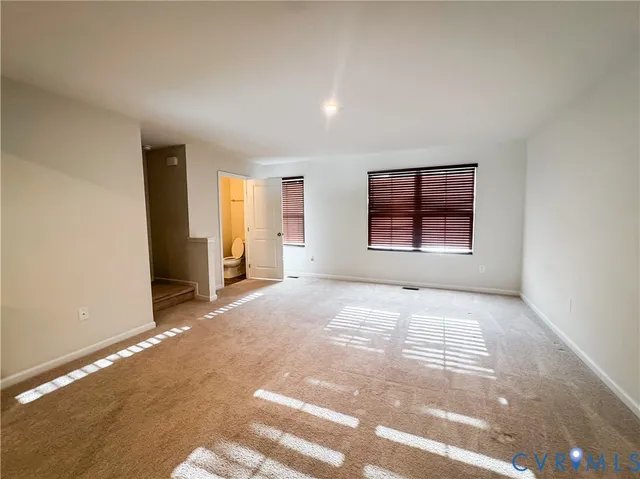 a kitchen with a sink stove and microwave
