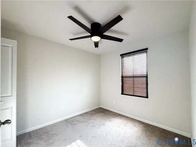 a front view of a house with a garage