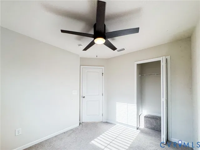 a view of a fountain in front of a house