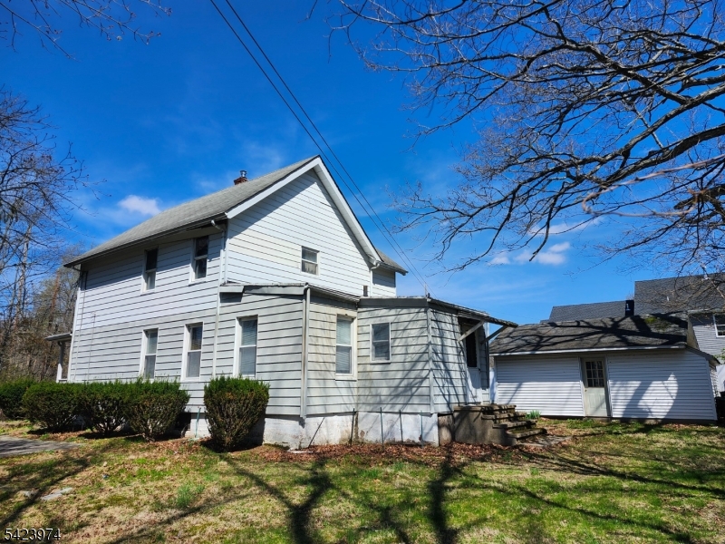 5 Locust Street Wanaque, NJ 07420 - Photo 6 of 23 a view of house with backyard porch and entertaining space