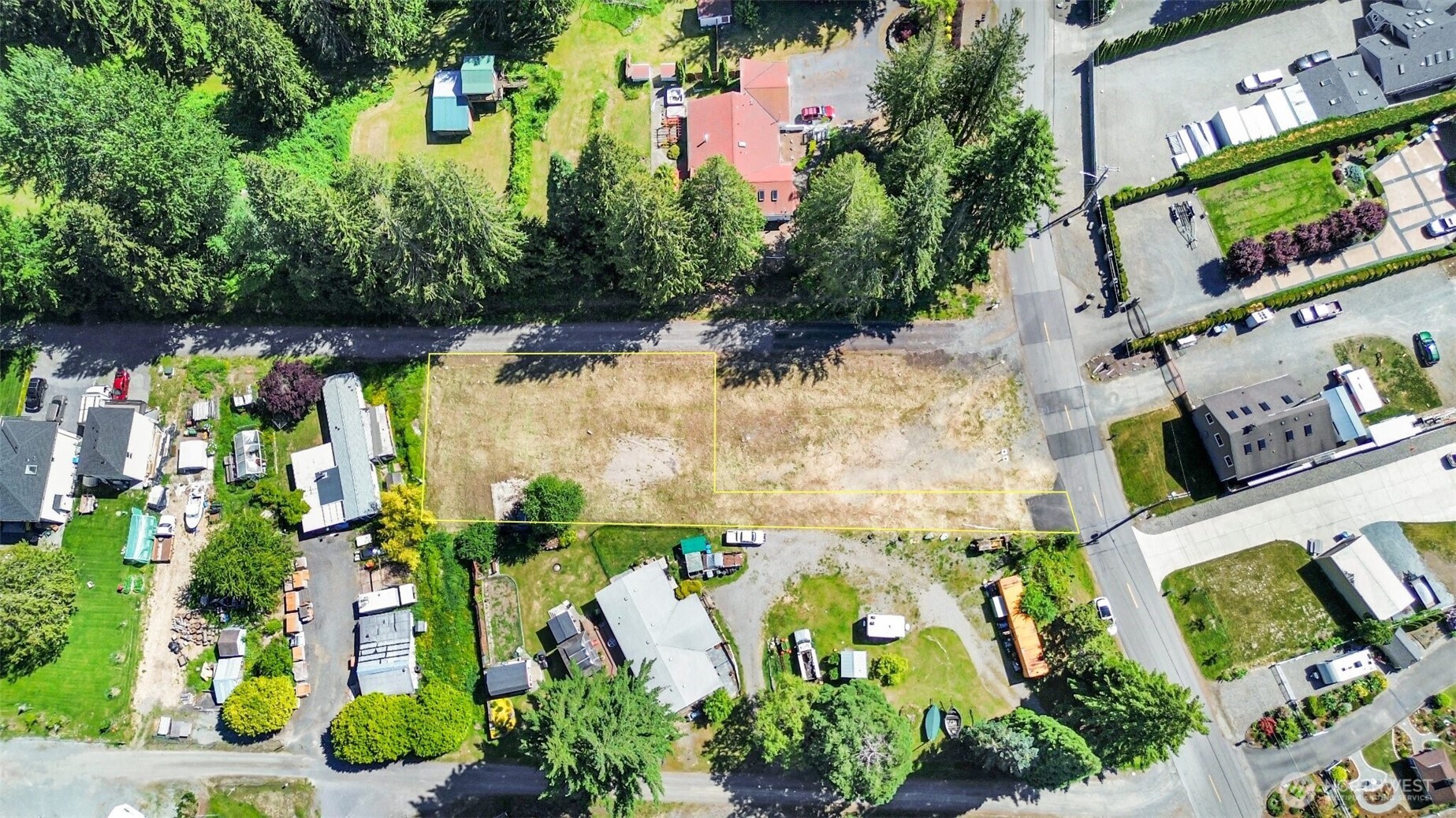 7013 Vandermark Road East Bonney Lake, WA 98391 - Photo 3 of 7 an aerial view of houses with yard