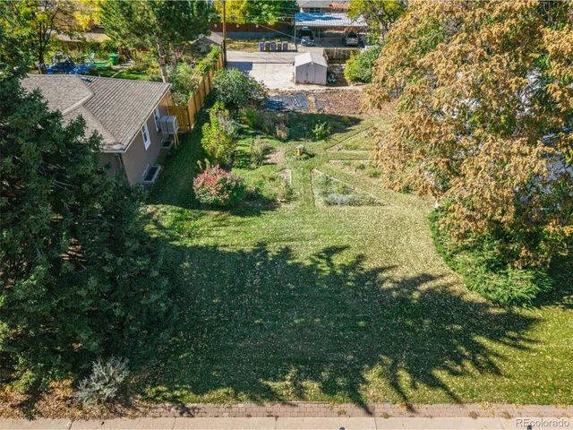 a view of house with yard