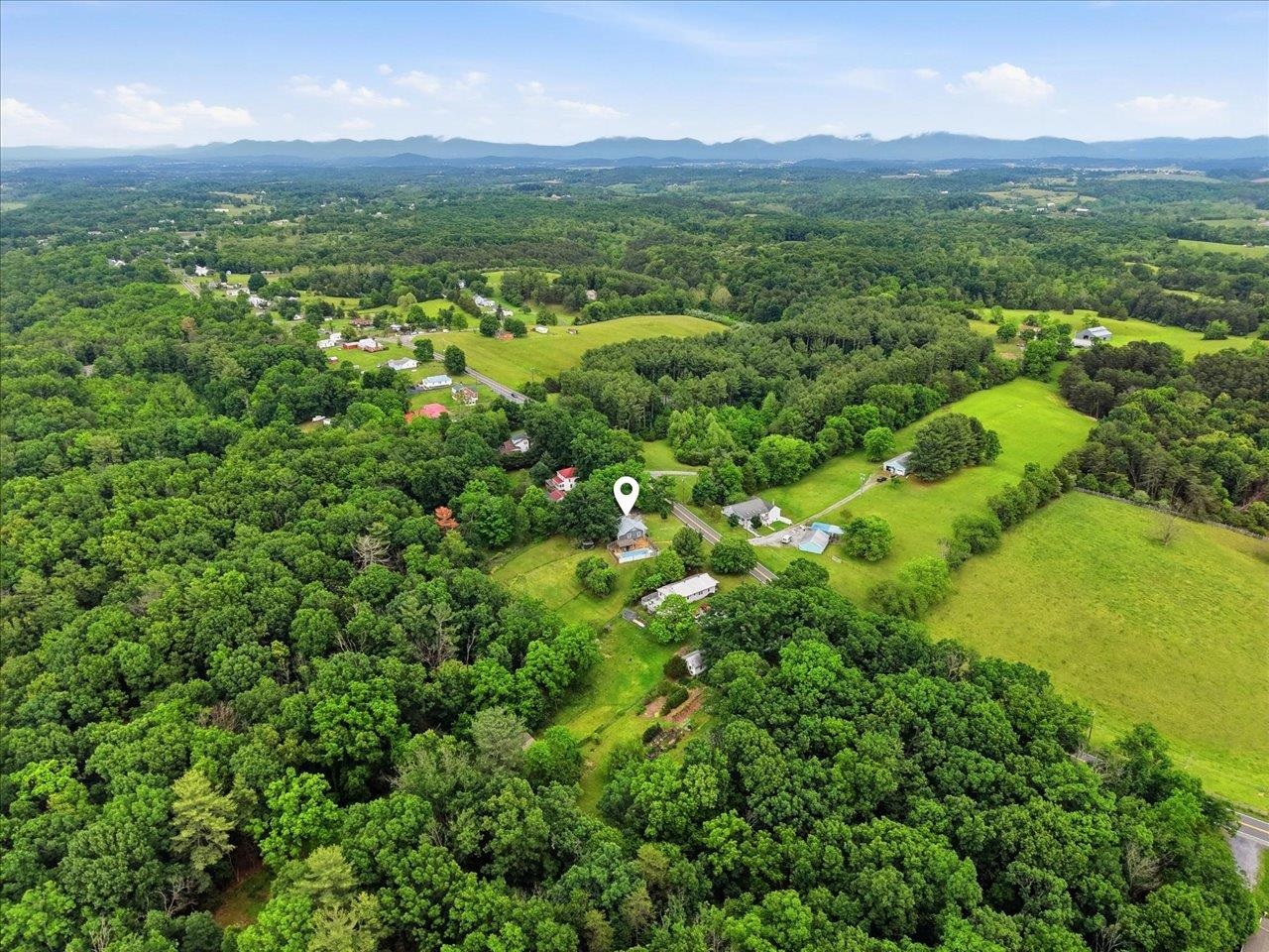 1296 New Hope Road Staunton, VA 24401 - Photo 33 of 37 a view of a lush green hillside and houses