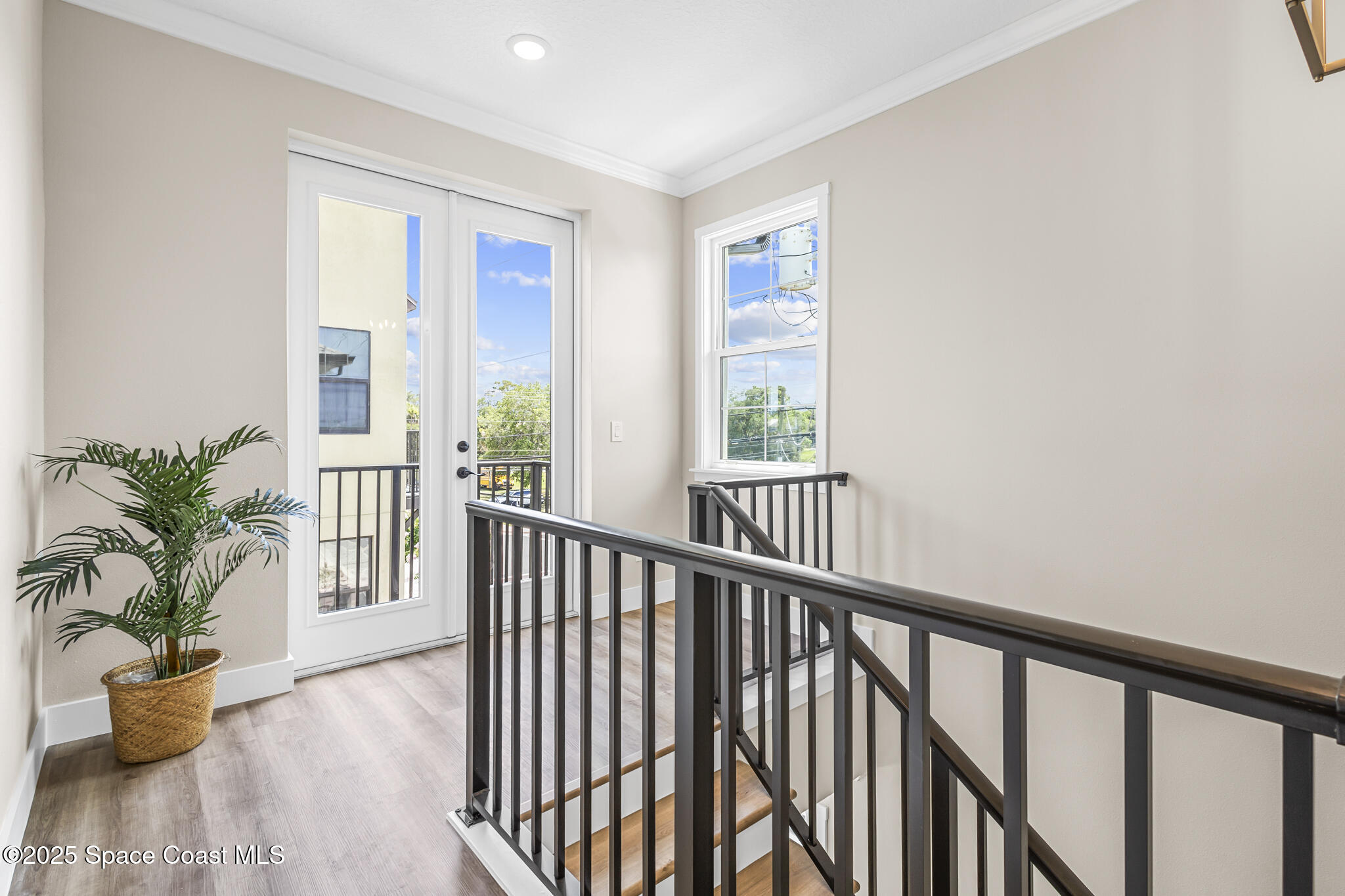840 Florida Avenue, Unit 5 Cocoa, FL 32922 - Photo 26 of 31 a view of a porch with wooden floor