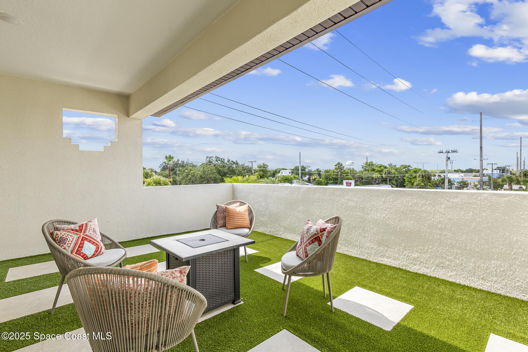 840 Florida Avenue, Unit 5 Cocoa, FL 32922 - Photo 28 of 31 a view of a chairs and table in the terrace