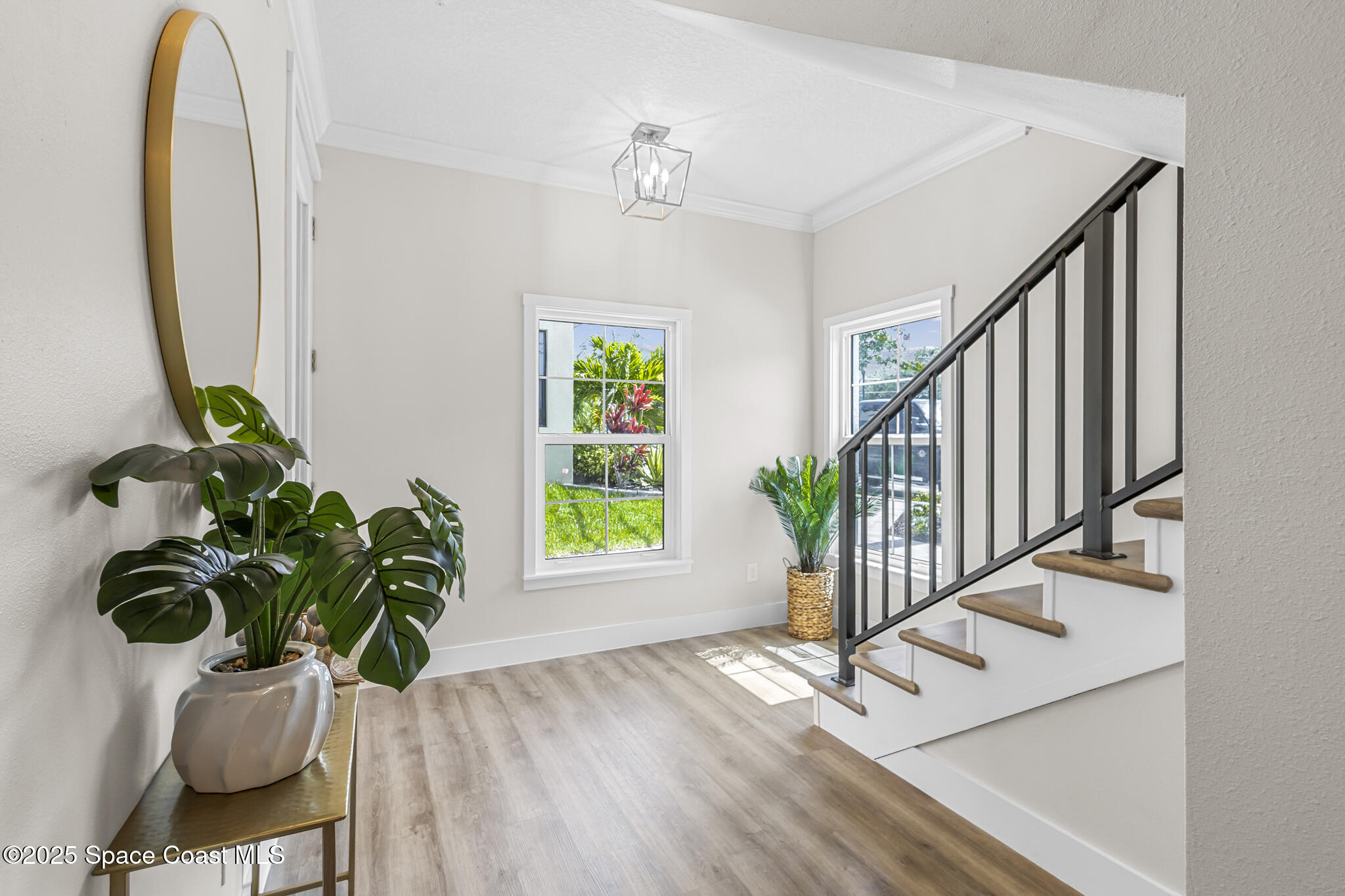 840 Florida Avenue, Unit 5 Cocoa, FL 32922 - Photo 5 of 31 a view of an entryway with wooden floor