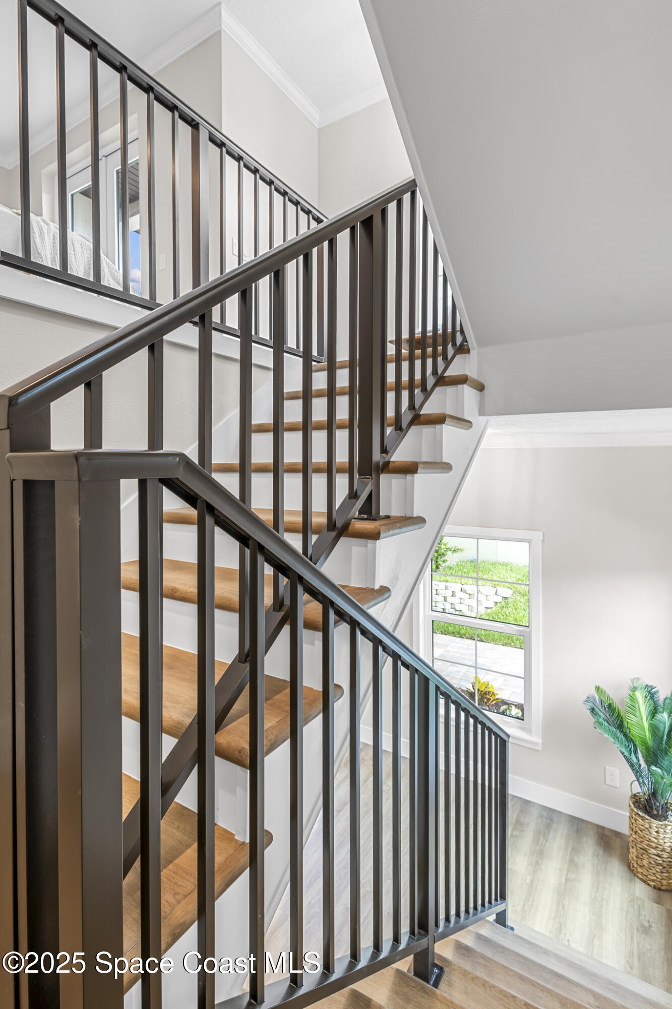 840 Florida Avenue, Unit 5 Cocoa, FL 32922 - Photo 9 of 31 a view of staircase with railing and stairs