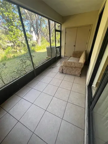 a view of a room and window