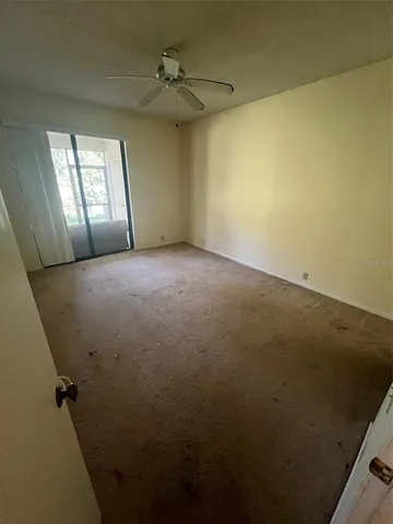 en empty room with windows