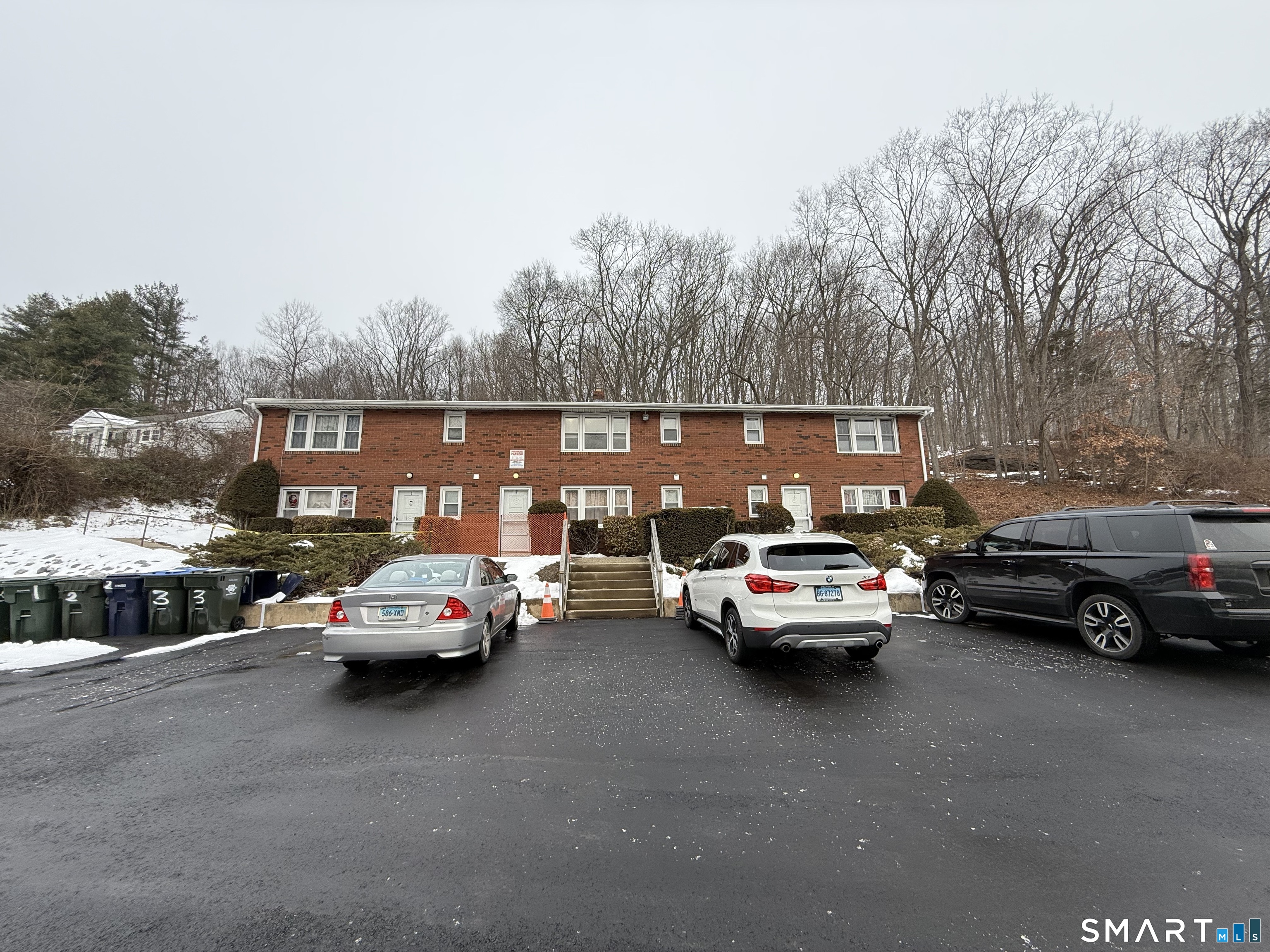 30 Bungay Road, Unit 5 Seymour, CT 06483 - Photo 2 of 14 a view of street with parked cars