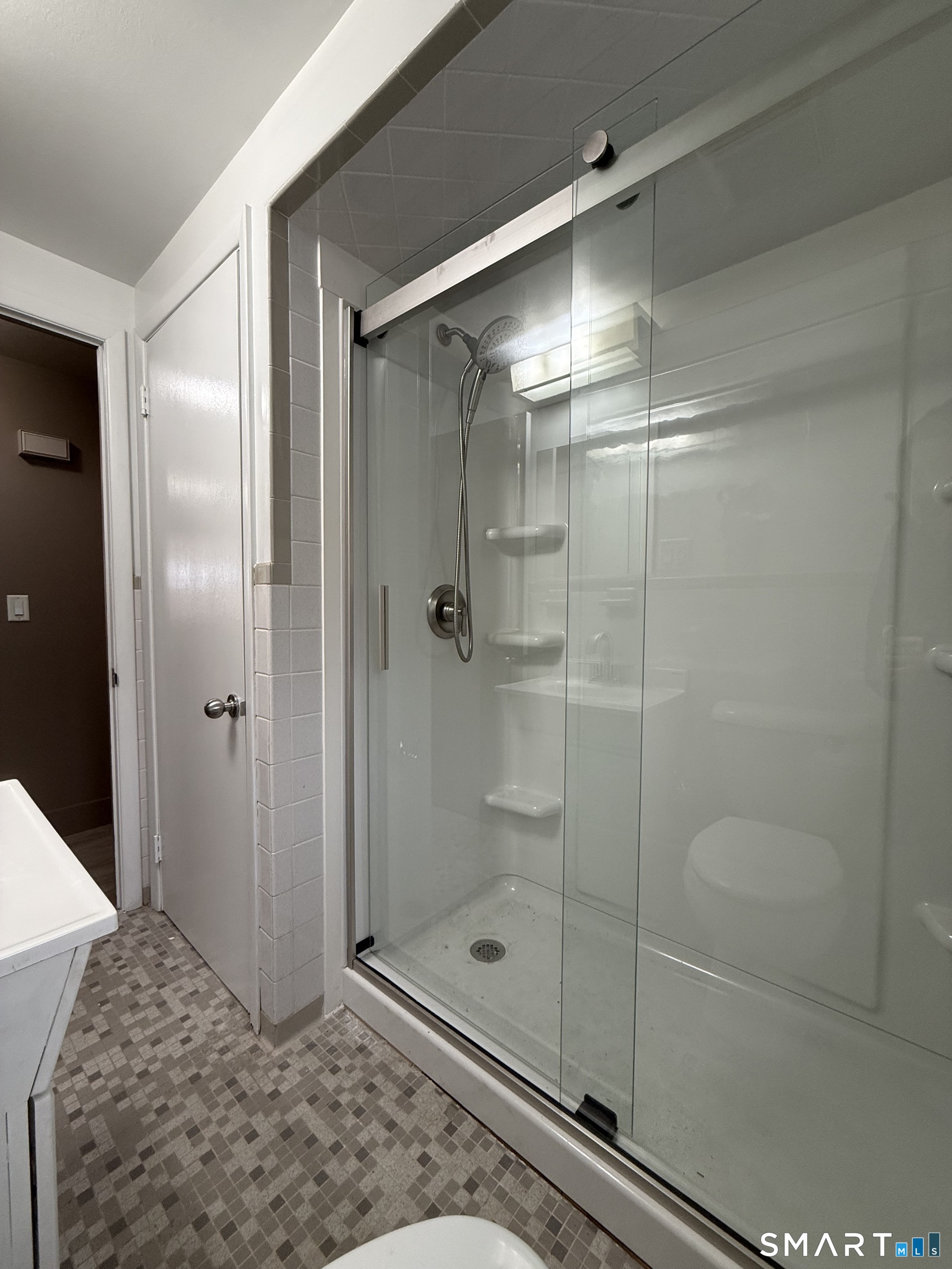 30 Bungay Road, Unit 5 Seymour, CT 06483 - Photo 5 of 14 a bathroom with a glass shower door