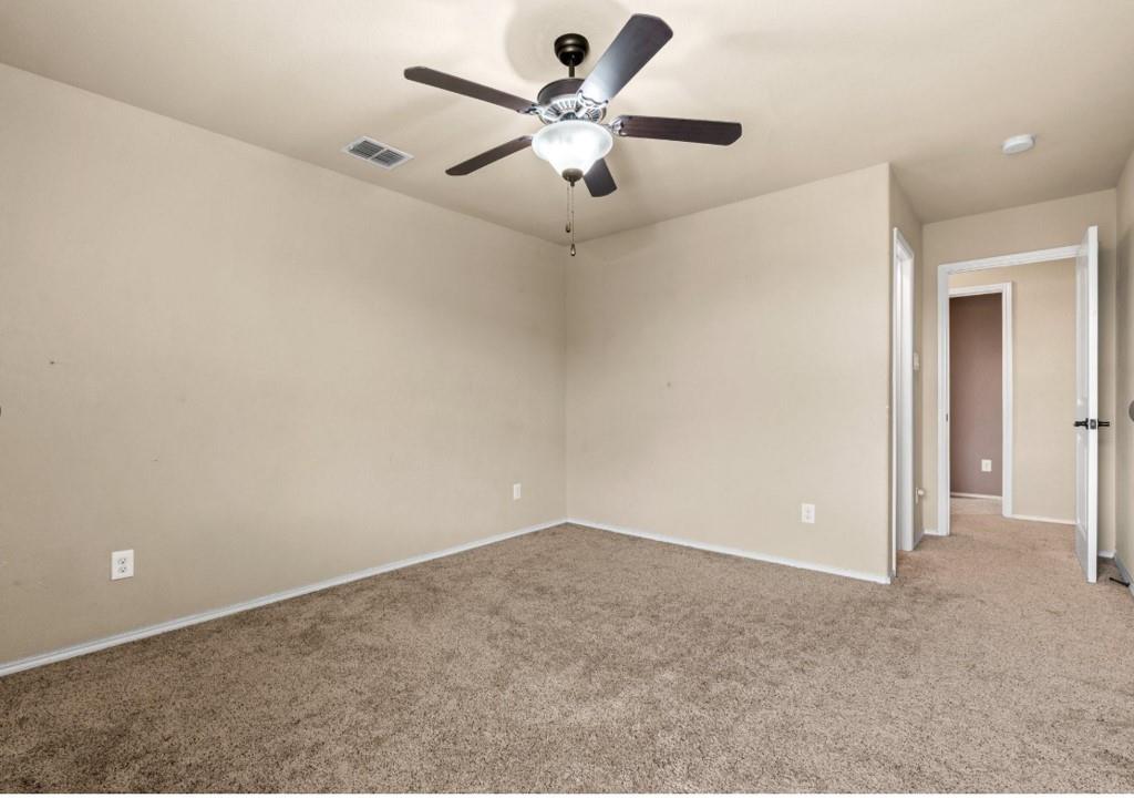 8404 Sioux Trail Aubrey, TX 76227 - Photo 2 of 20 a view of an empty room