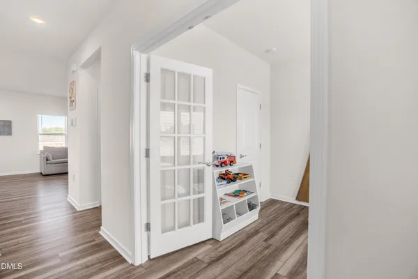 a view of livingroom with furniture and wooden floor