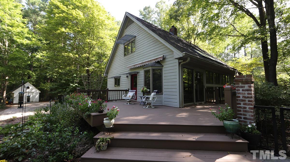 2413 Pleasant Union Church Road Raleigh, NC 27614 - Photo 12 of 30 Enjoy sitting on your back deck in your private yard with lush landscaping .
