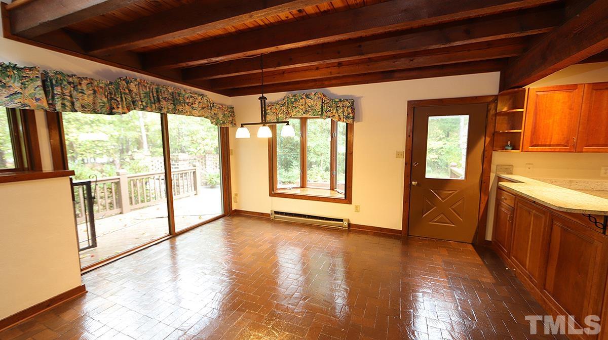 2413 Pleasant Union Church Road Raleigh, NC 27614 - Photo 13 of 30 Room for a large table here and sliding doors out to the side Deck.