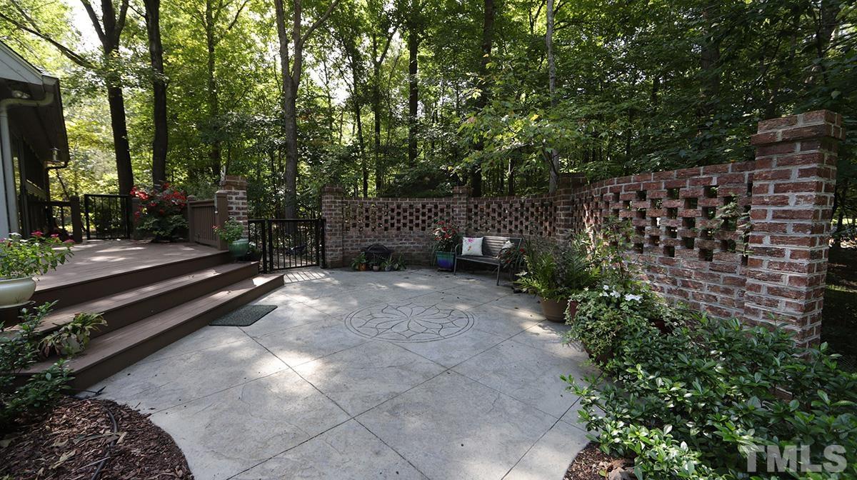 2413 Pleasant Union Church Road Raleigh, NC 27614 - Photo 14 of 30 Spread out further onto this patio with newer gorgeous brick wall.