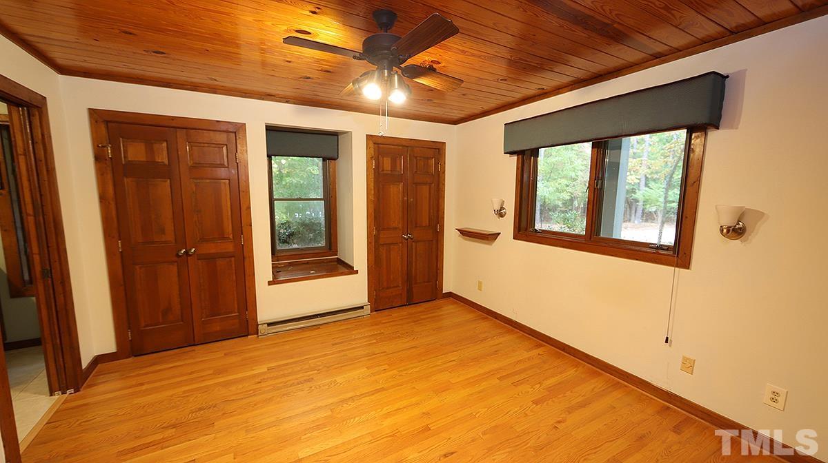 2413 Pleasant Union Church Road Raleigh, NC 27614 - Photo 16 of 30 Nice closets and window seat that contains a cedar-lined storage area.