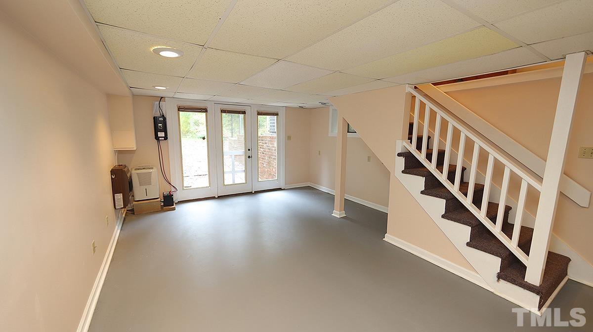 2413 Pleasant Union Church Road Raleigh, NC 27614 - Photo 25 of 30 Plenty of options in this basement for a Rec Room, Exercise Room or Office with entrance out to back yard.