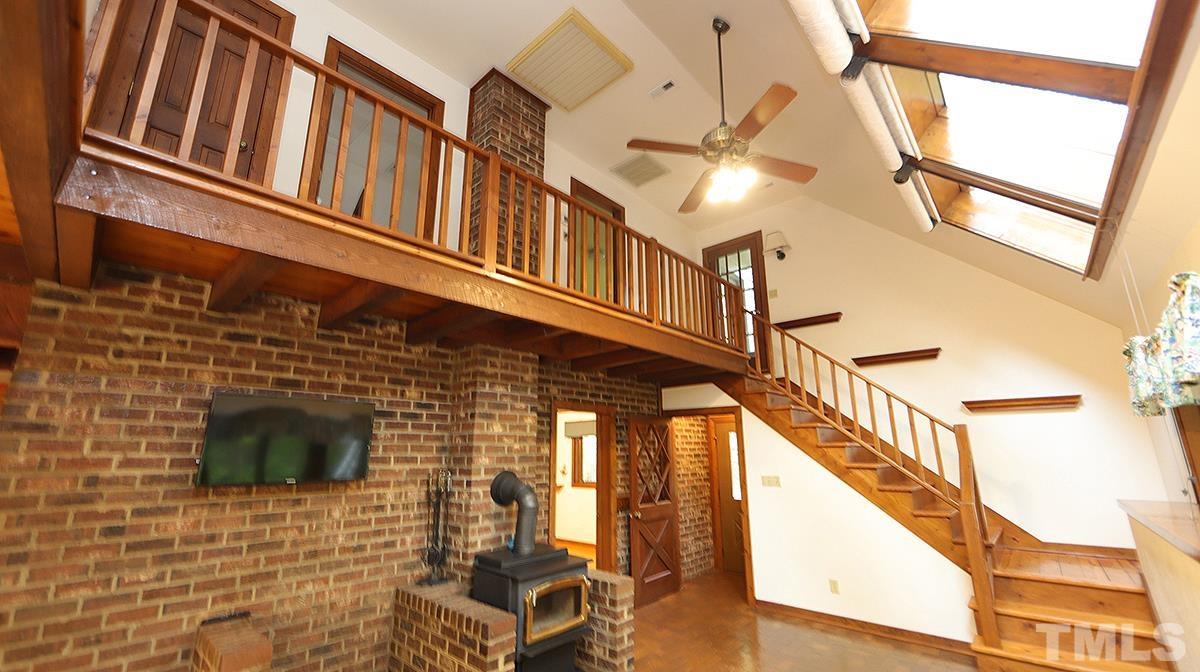 2413 Pleasant Union Church Road Raleigh, NC 27614 - Photo 4 of 30 Wonderful high ceiling to let the light in. Be sure to see the attached flyer on how this home uses solar energy.