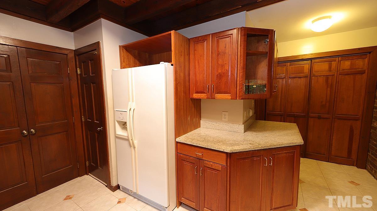 2413 Pleasant Union Church Road Raleigh, NC 27614 - Photo 8 of 30 Laundry closet to right and basement stairs to left. (lights come on automatically as you walk down)