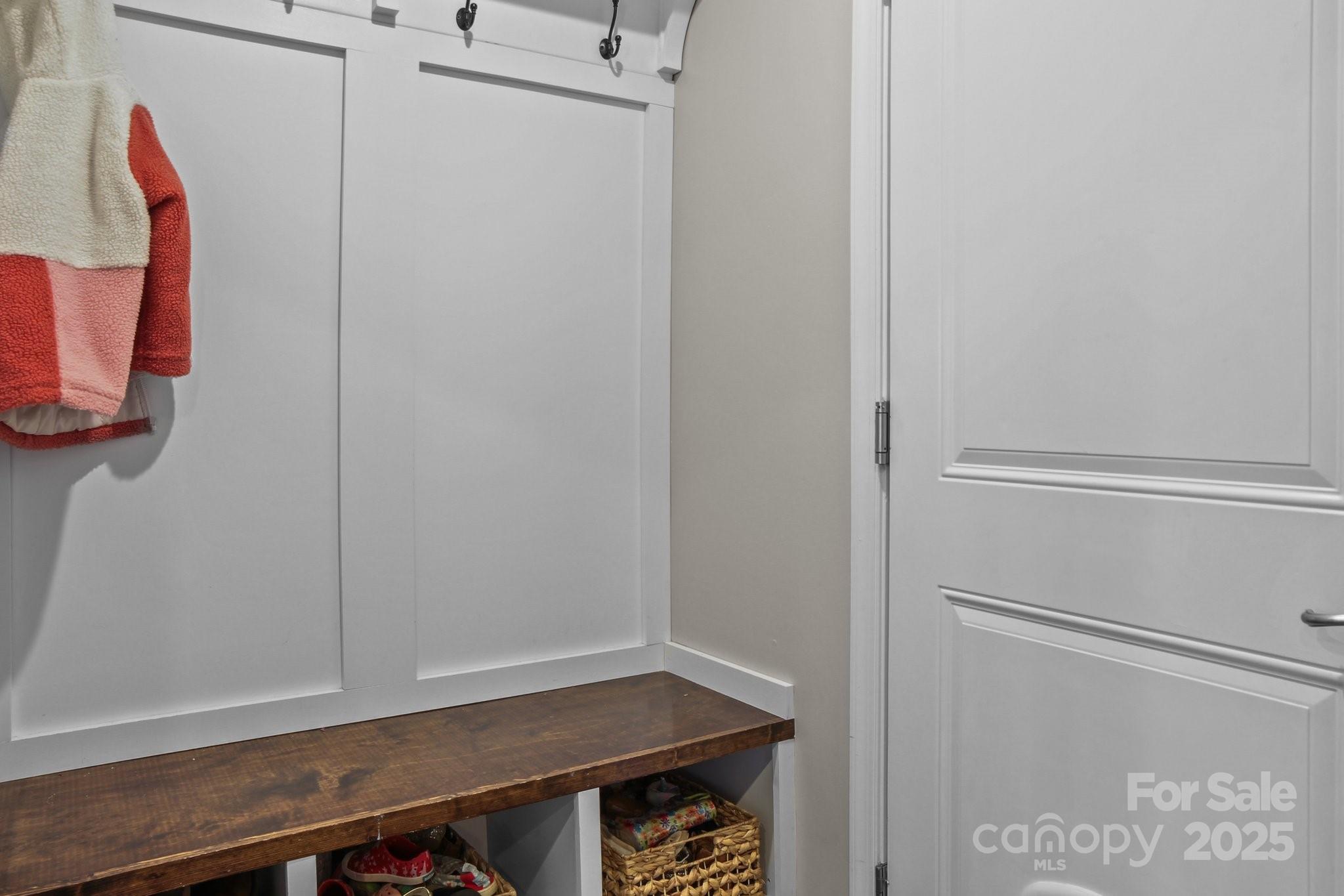 7520 West Berkeley Road Denver, NC 28037 - Photo 19 of 38 a view of walk in closet with clothes