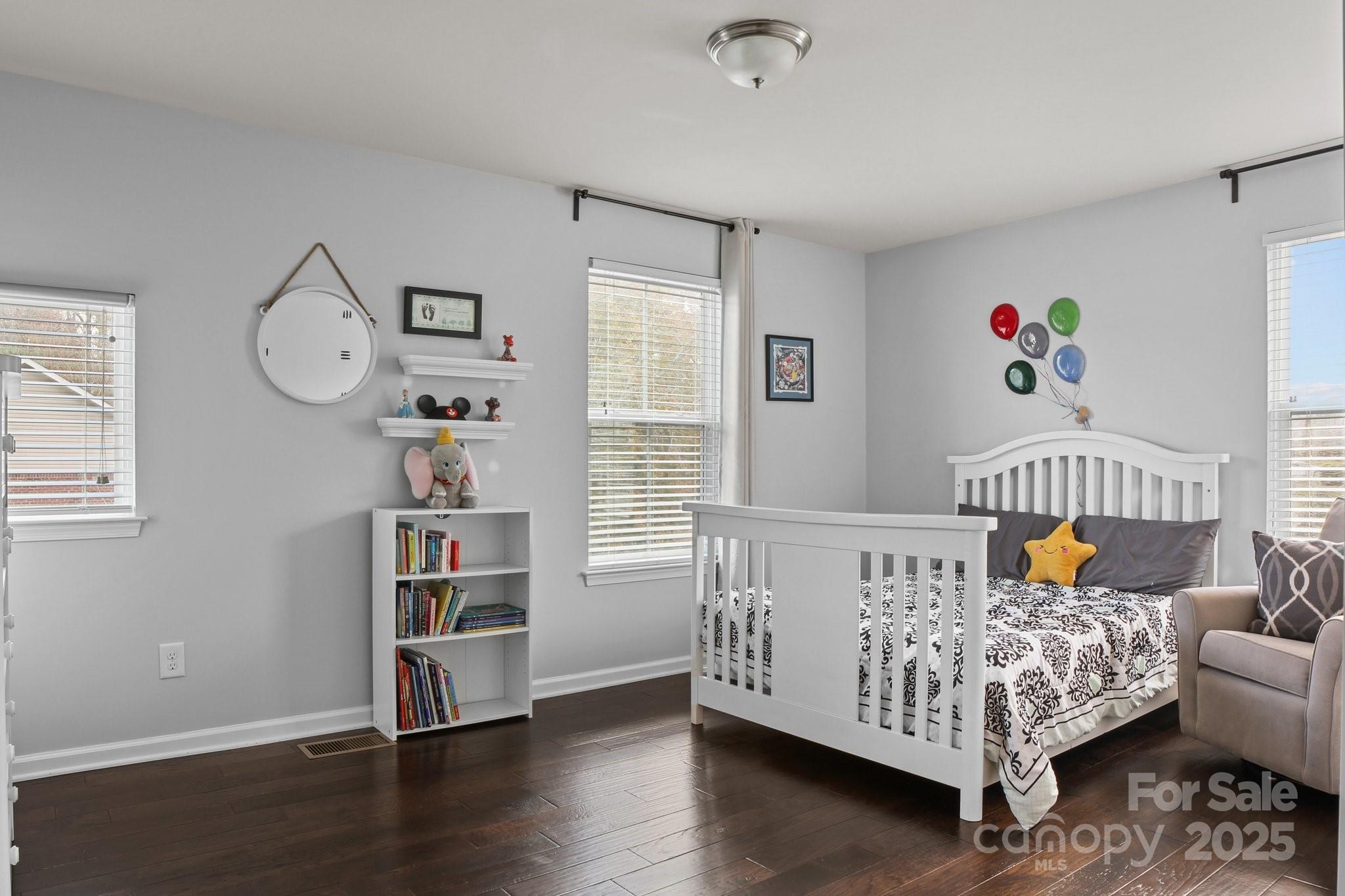 7520 West Berkeley Road Denver, NC 28037 - Photo 22 of 38 a bed room with furniture and a window