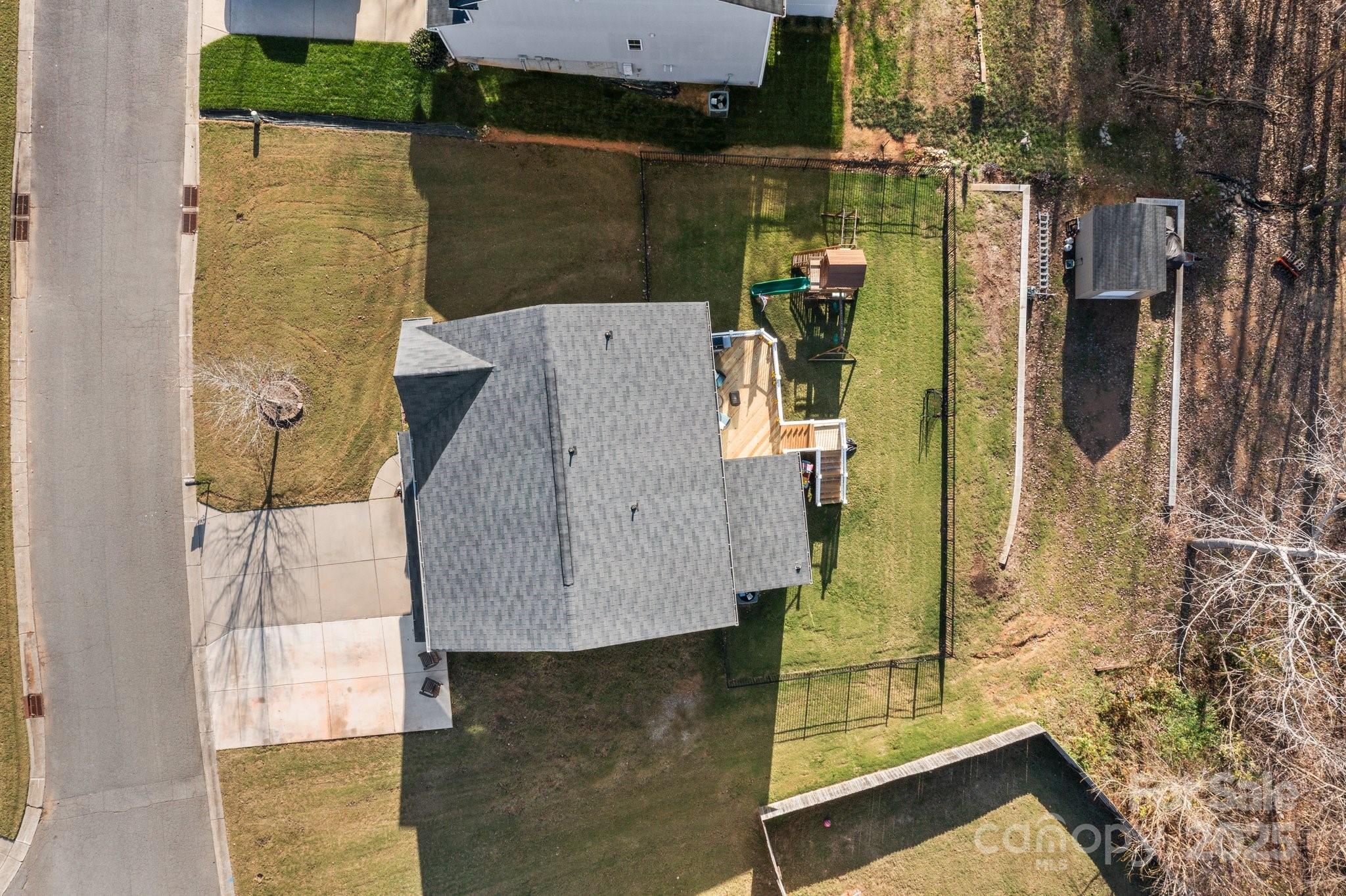 7520 West Berkeley Road Denver, NC 28037 - Photo 4 of 38 an aerial view of residential houses with outdoor space