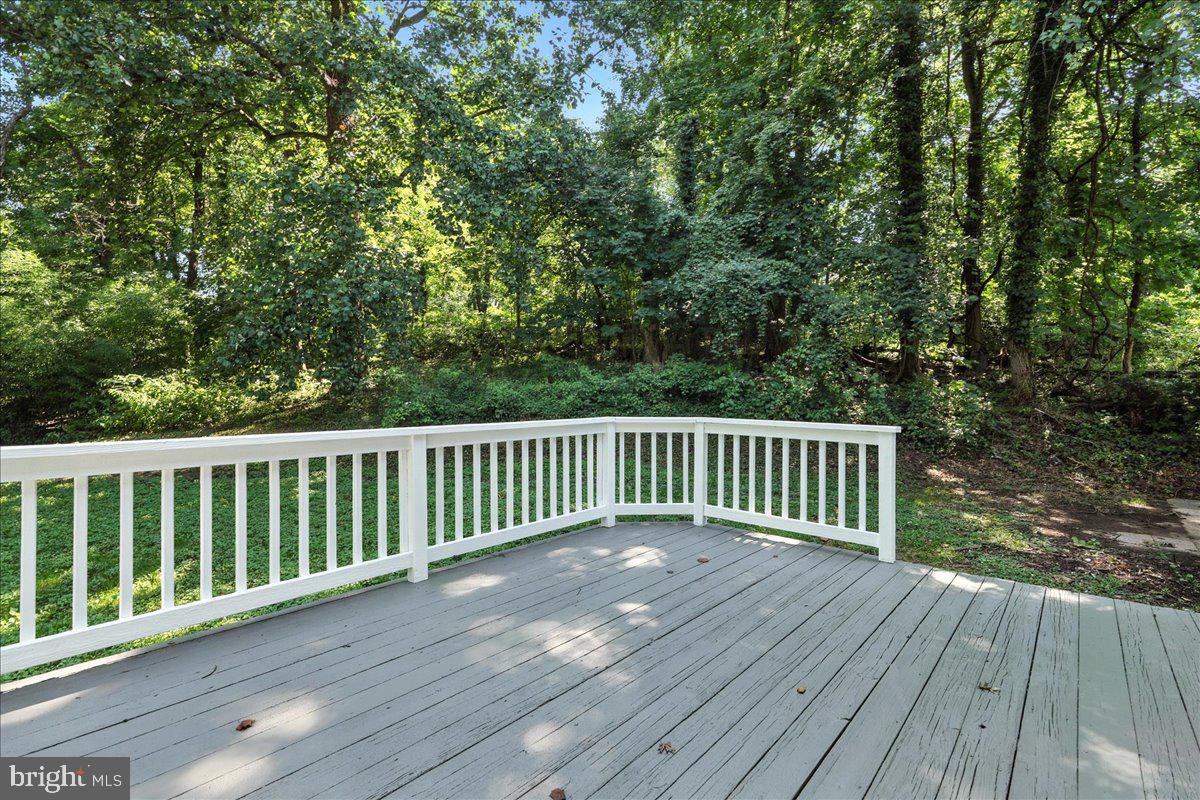 5757 Elkridge Heights Road Elkridge, MD 21075 - Photo 38 of 43 a view of balcony with wooden floor and fence