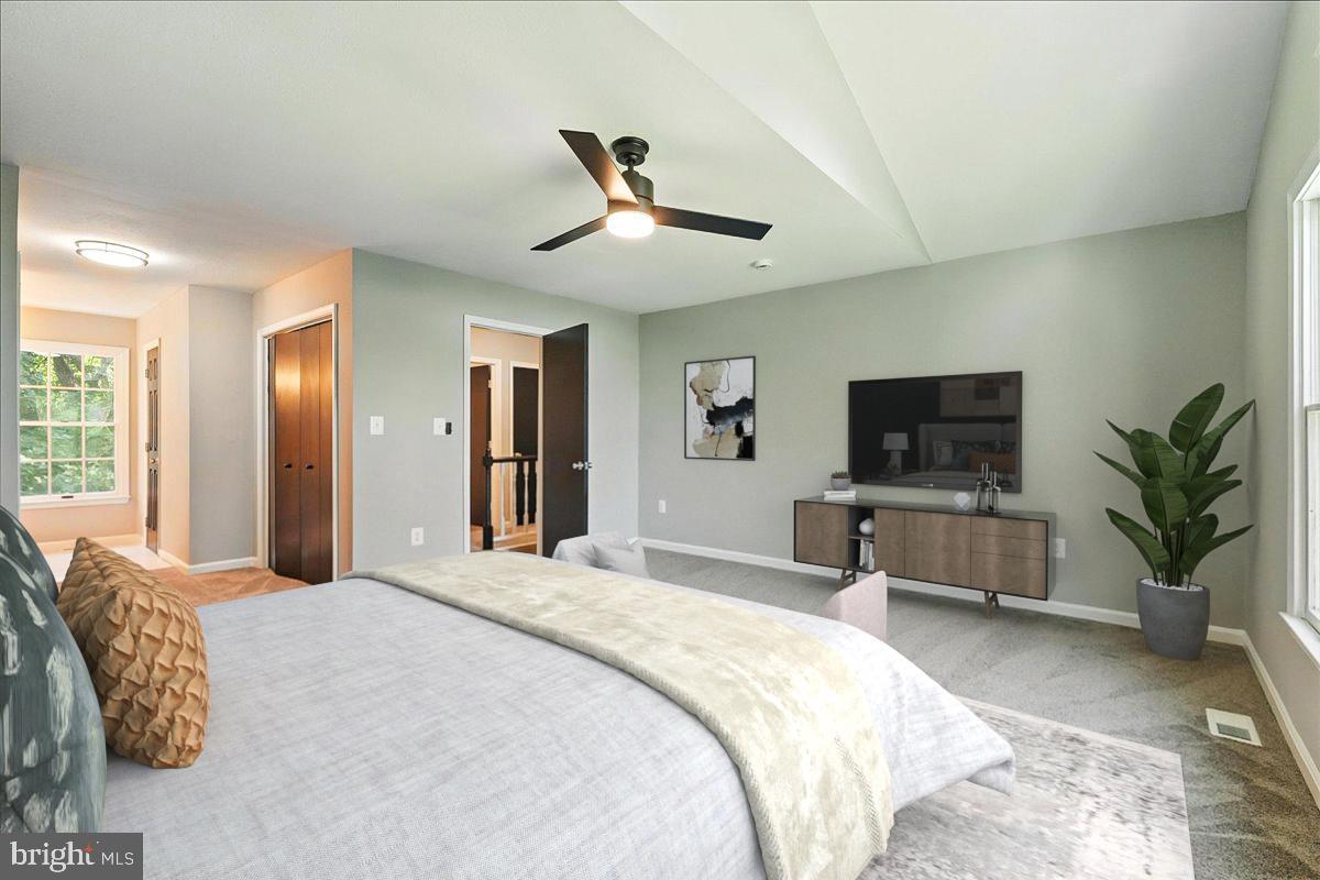 5757 Elkridge Heights Road Elkridge, MD 21075 - Photo 10 of 43 a bedroom with a bed and a television
