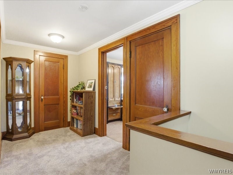 699 Losson Road Cheektowaga, NY 14227 - Photo 17 of 50 The upstairs hallway has new carpet over original