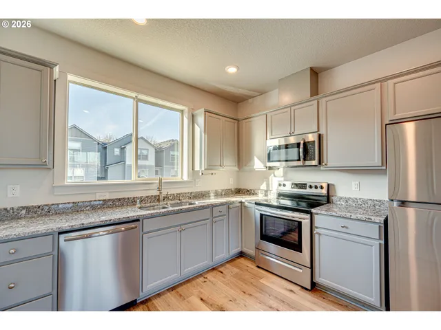a view of a living room and bathroom