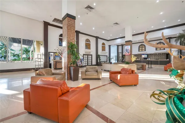 a living room with furniture and a table