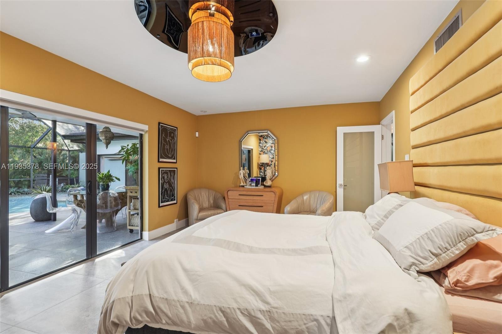 8375 Southwest 185th Terrace Cutler Bay, FL 33157 - Photo 13 of 35 a bedroom with a bed and window